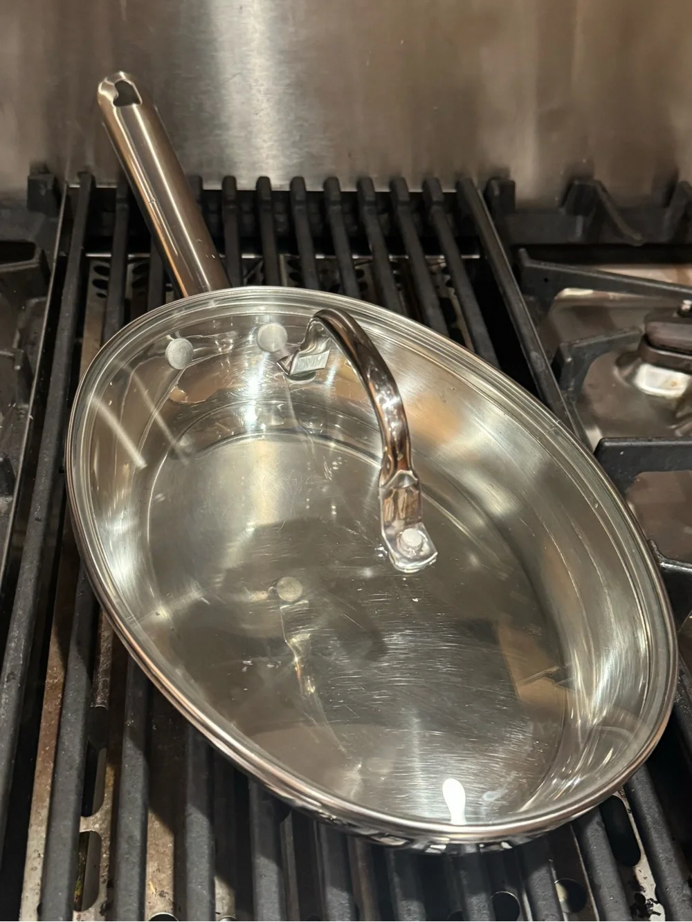 Wolfgang puck cafe collection 12” oval skillet 18/10 stainless steel with lid